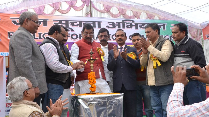 The MP, Shri Bharat Singh lighting the lamp to inaugurate the Public Information Campaign..
