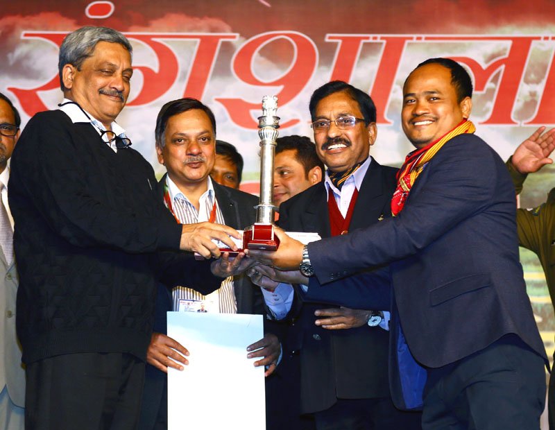 The Union Minister for Defence, Shri Manohar Parrikar presenting the award for..