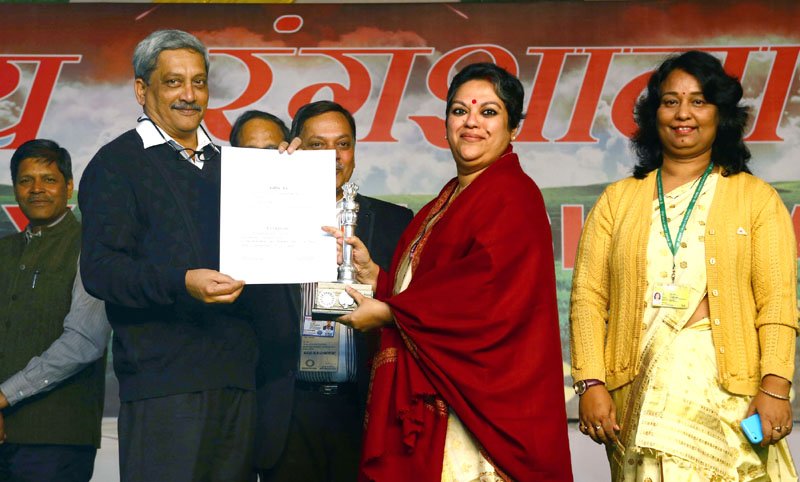 The Union Minister for Defence, Shri Manohar Parrikar presenting the award for..