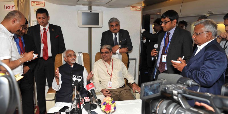 The Vice President, Shri M. Hamid Ansari addressing a Press Conference on board ..