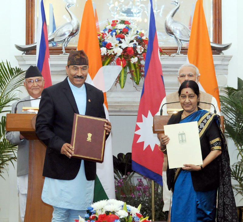 The Prime Minister, Shri Narendra Modi and the Prime Minister of Nepal, Shri K.P. Sharma Oli ..