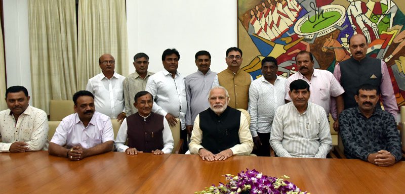 A delegation of farmers and local representatives of Rajkot led by the Minister of ..