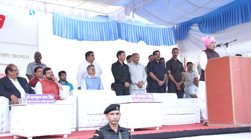 The Union Home Minister, Shri Rajnath Singh addressing the gathering at the Guru Hanuman ..