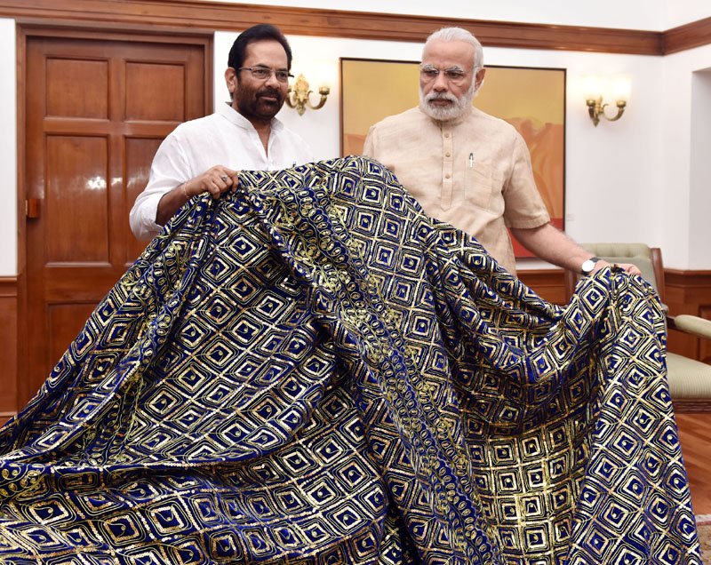 The Prime Minister, Shri Narendra Modi handing over the “Chaadar” to be offered ..