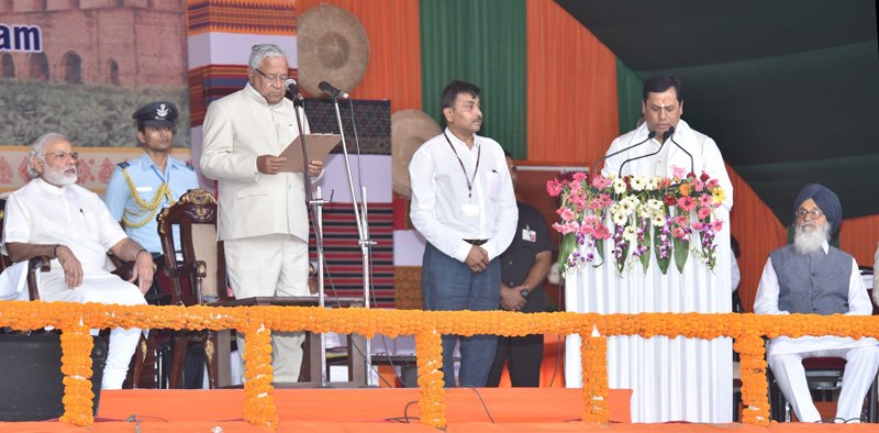 The Prime Minister, Shri Narendra Modi at the Swearing-in Ceremony of the New Government of Assam, in Guwahati