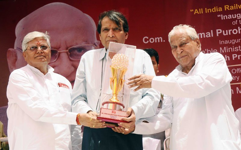 The Union Minister for Railways, Shri Suresh Prabhakar Prabhu being presented ..