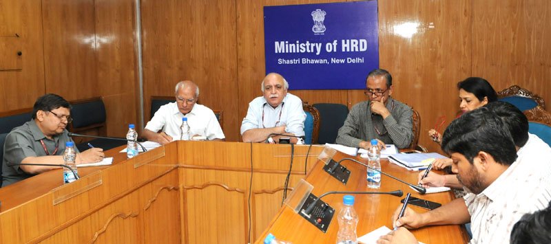 The Secretary, Department of Higher Education, Shri V.S. Oberoi with the Chairman, ..