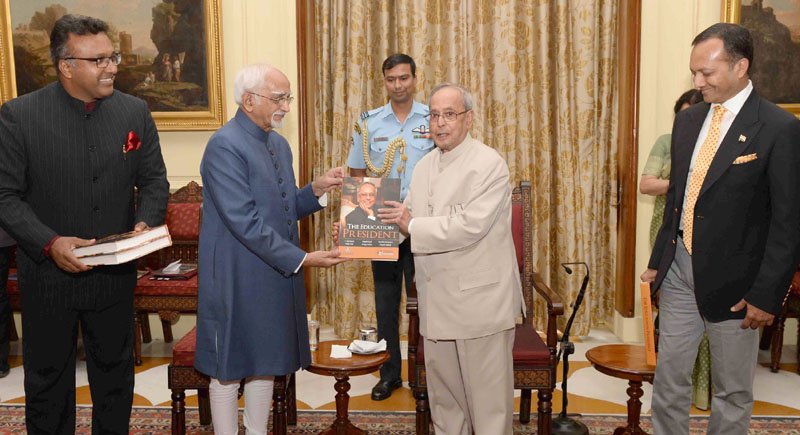 The President, Shri Pranab Mukherjee receiving the first copy of the book “The Education President”..