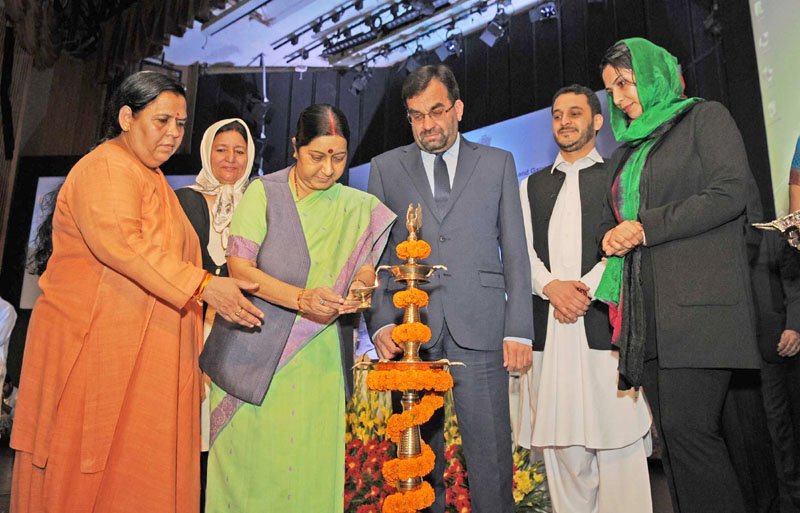 The Union Minister for External Affairs, Smt. Sushma Swaraj lighting the lamp at ..