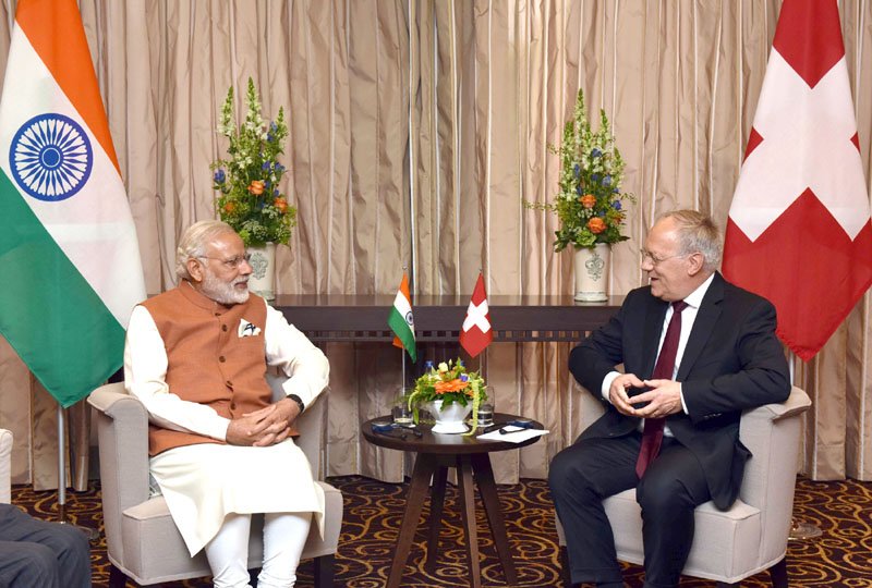 The Prime Minister, Shri Narendra Modi with the President of the Swiss Confederation, ..