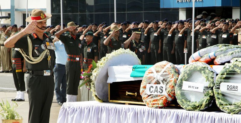 The Chief of Army Staff, General Dalbir Singh paying homage at the mortal remains of ..