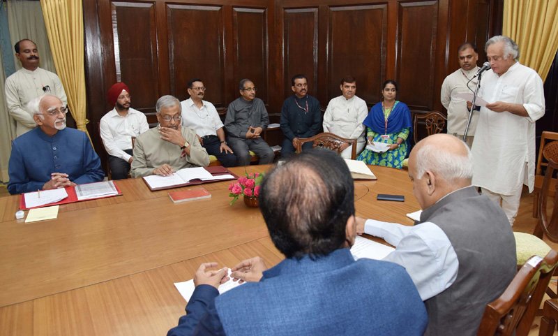 The Vice President and Chairman, Rajya Sabha, Shri M. Hamid Ansari administering..