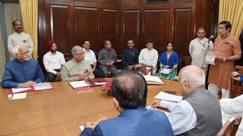 The Vice President and Chairman, Rajya Sabha, Shri M. Hamid Ansari administering the oath ..
