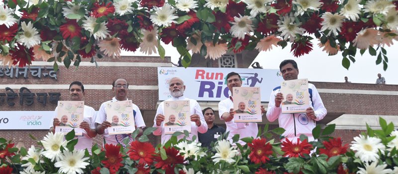 The Prime Minister, Shri Narendra Modi releasing a publication of SAI ..