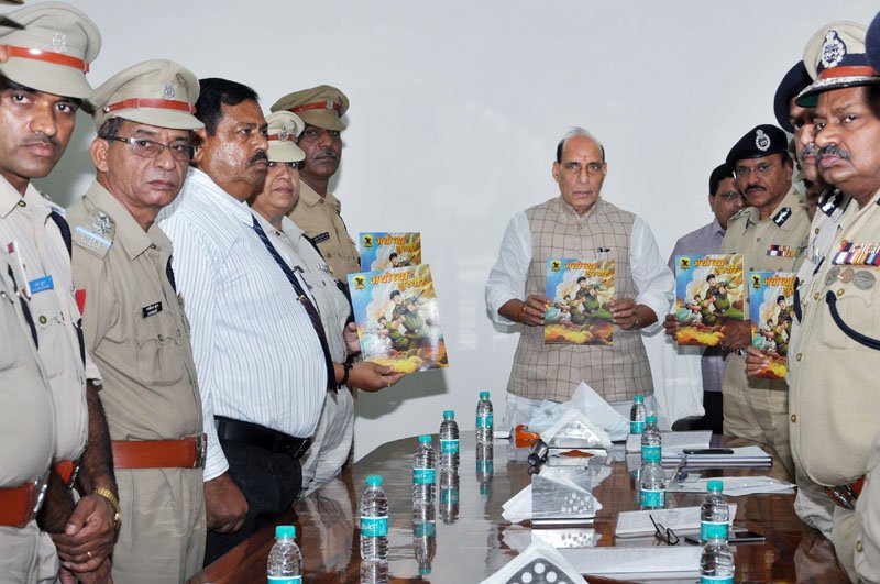 The Union Home Minister, Shri Rajnath Singh releasing an illustrative book of the..