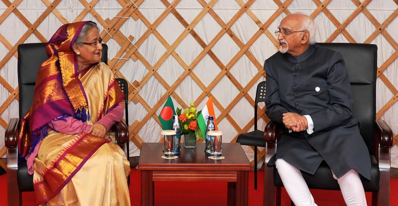 The Vice President, Shri M. Hamid Ansari in a bilateral meeting with the Prime Minister of Bangladesh,..