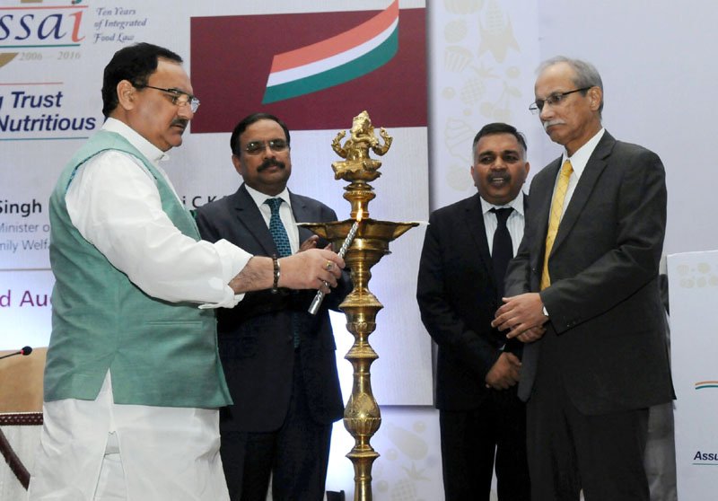 The Union Minister for Health & Family Welfare, Shri J.P. Nadda lighting..