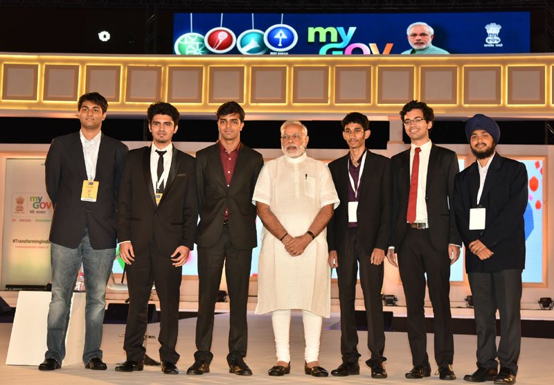 The Prime Minister, Shri Narendra Modi with the young contributors ..