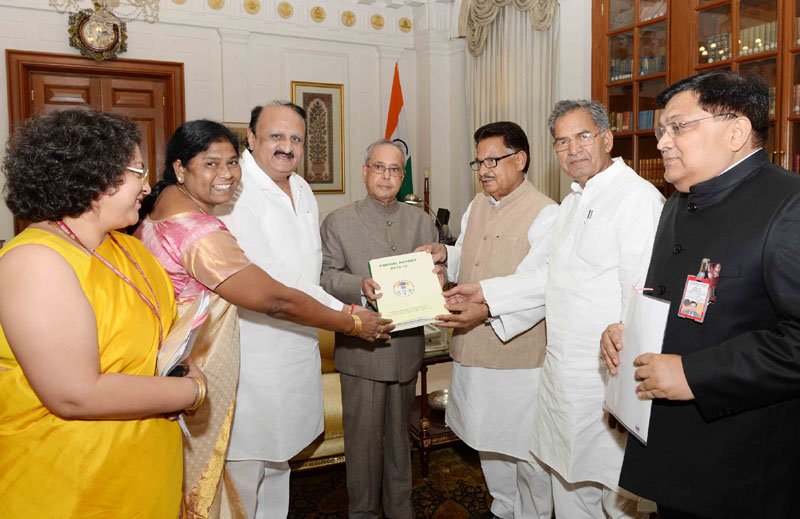 The President, Shri Pranab Mukherjee receiving the annual report for the period 2015-2016