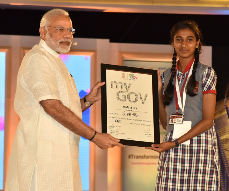 The Prime Minister, Shri Narendra Modi distributing the certificate to..