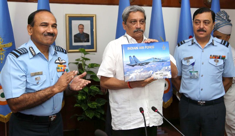 The Union Minister for Defence, Shri Manohar Parrikar releasing the Coffee Table Book of IAF…
