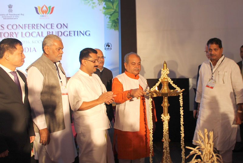 Shri Narendra Singh Tomar lighting the lamp to inaugurate the BRICS Conference on Participatory Local Budgeting
