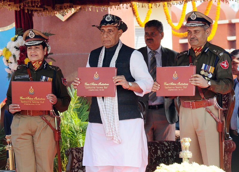 The Union Home Minister Shri Rajnath Singh releasing a booklet titled..