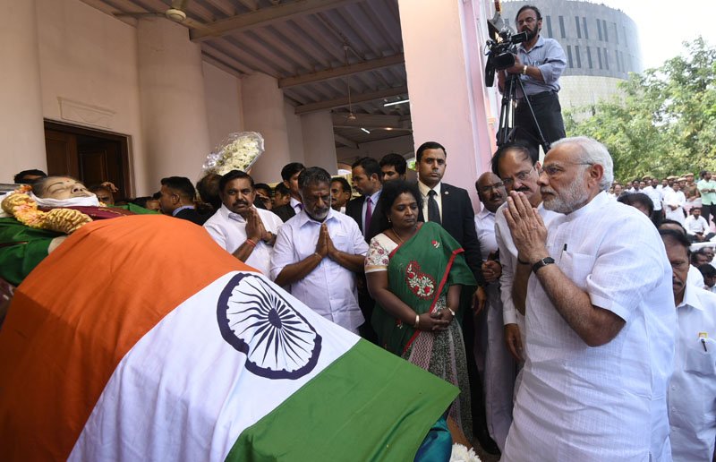 The Prime Minister, Shri Narendra Modi pays tributes to the mortal remains of..