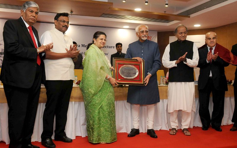 The Vice President, Shri M. Hamid Ansari presenting the WTCA Award to..