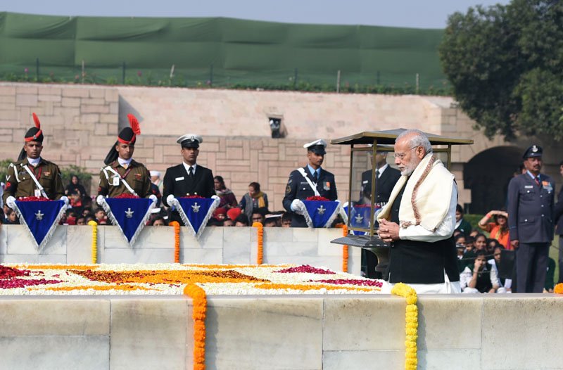 The Prime Minister, Shri Narendra Modi performing parikrama at the Samadhi of Mahatma Gandhi on the occasion of Martyr’s Day, at Rajghat, in Delhi