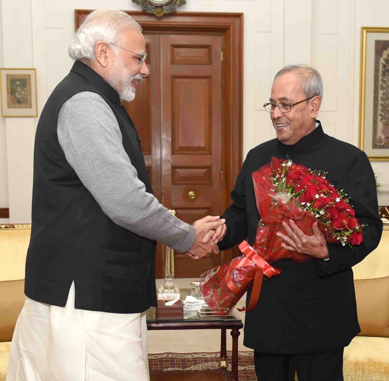 The Prime Minister, Shri Narendra Modi greeting the President, ..