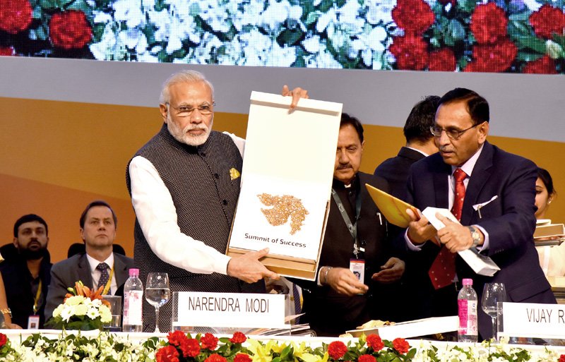 The Prime Minister, Shri Narendra Modi releasing the policy booklet ..