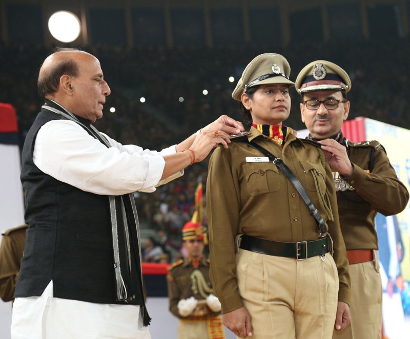 The Union Home Minister, Shri Rajnath Singh pinning the rank on a..