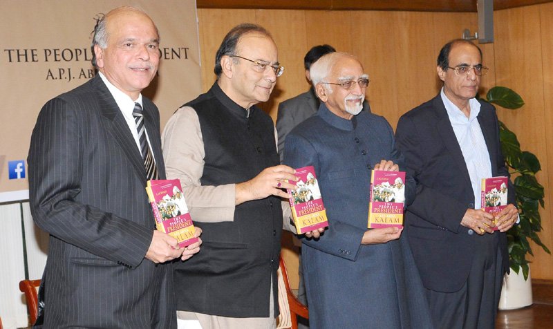 The Vice President, Shri M. Hamid Ansari releasing the book ..
