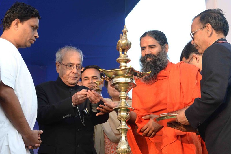 The President, Shri Pranab Mukherjee lighting the lamp at the..