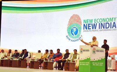 The Prime Minister, Shri Narendra Modi addressing the ‘Public Meeting’, after launching of ..